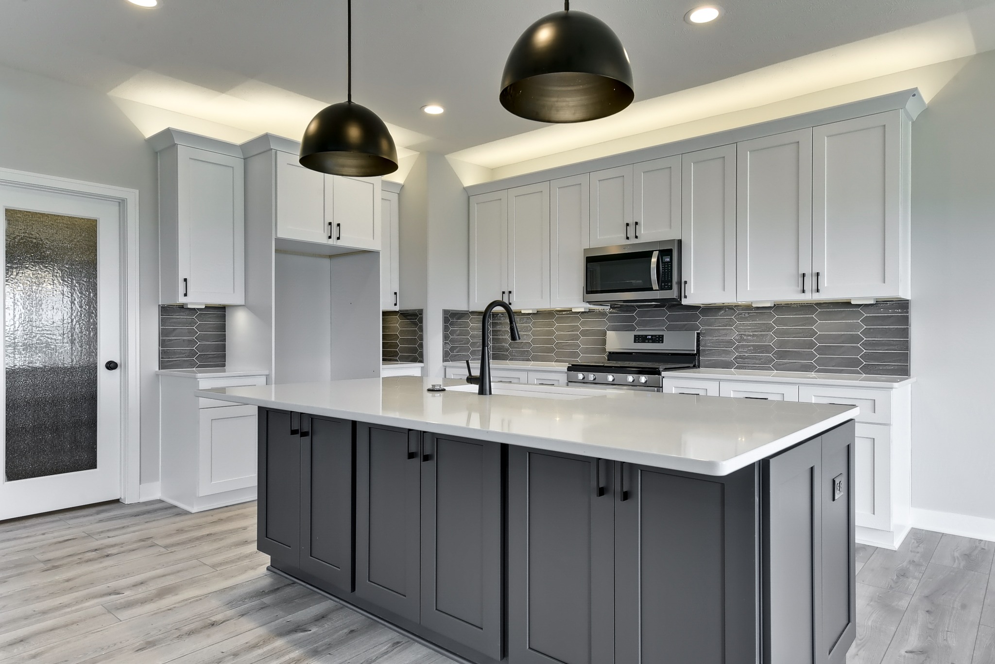 New construction home with white kitchen